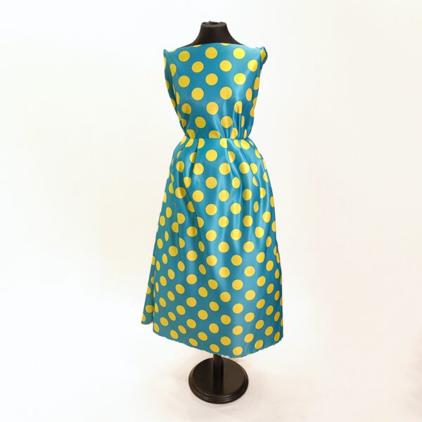 Tessuto Duchesse a fantasia motivo pois turchese - giallo