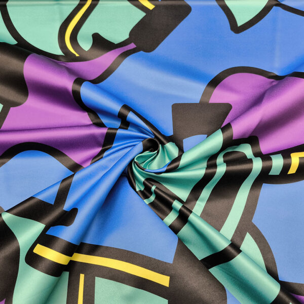 Tessuto Duchesse a fantasia motivo astratto blu elettrico - viola - nero - verde smeraldo