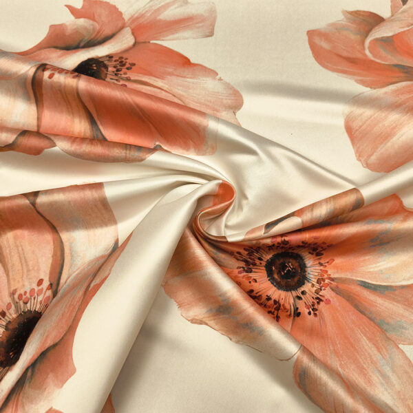 Tessuto Duchesse a fantasia motivo floreale corallo - bianco