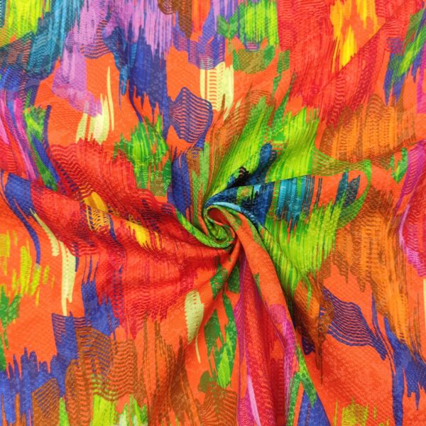 Tessuto Gabardine di Cotone a fantasia motivo astratto arancione - azzurro - fucsia