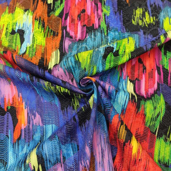 Tessuto Gabardine di Cotone a fantasia motivo astratto nero - verde - fucsia