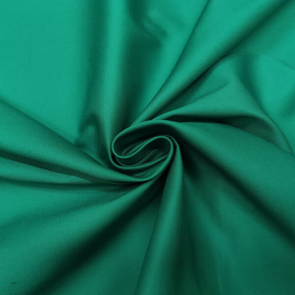 Tessuto Gabardine di cotone tinta unita verde petrolio