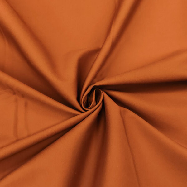 Tessuto Gabardine di cotone tinta unita mattone