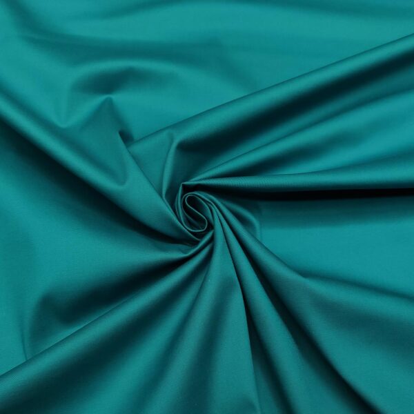 Tessuto Gabardine di cotone tinta unita verde pavone
