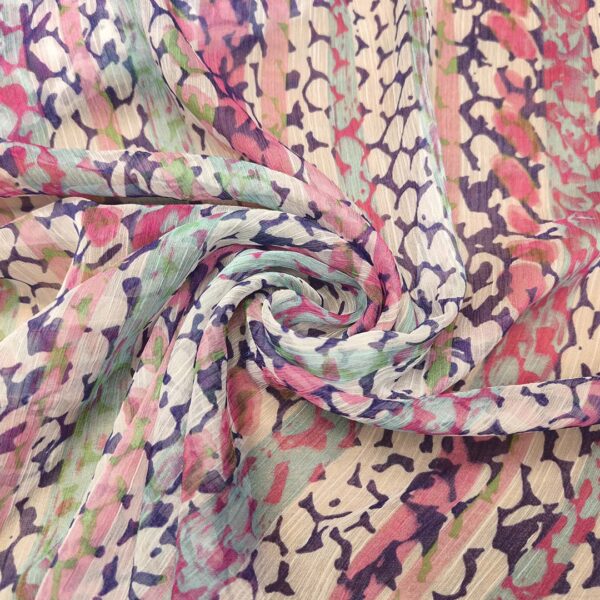 Tessuto Georgette a fantasia motivo astratto blu - fucsia - bianco