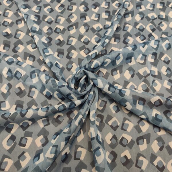 Tessuto Georgette a fantasia motivo astratto blu navy - carta da zucchero - bianco