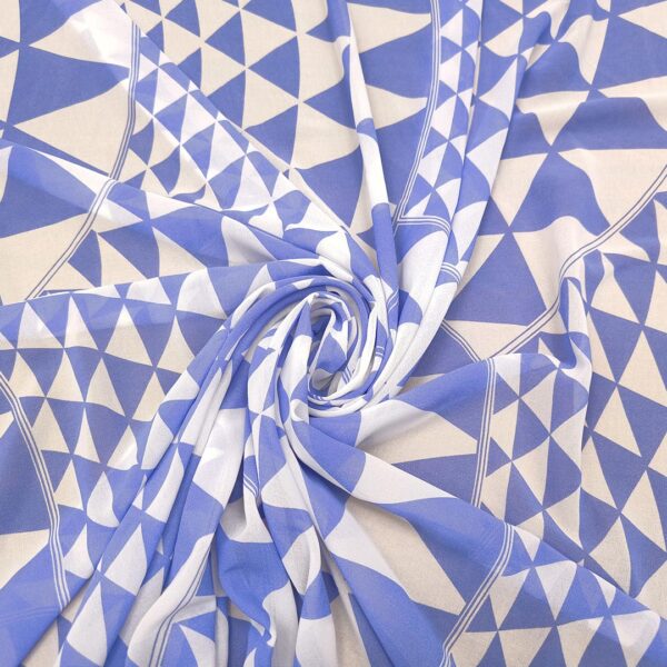 Tessuto Georgette a fantasia motivo astratto celeste scuro- bianco