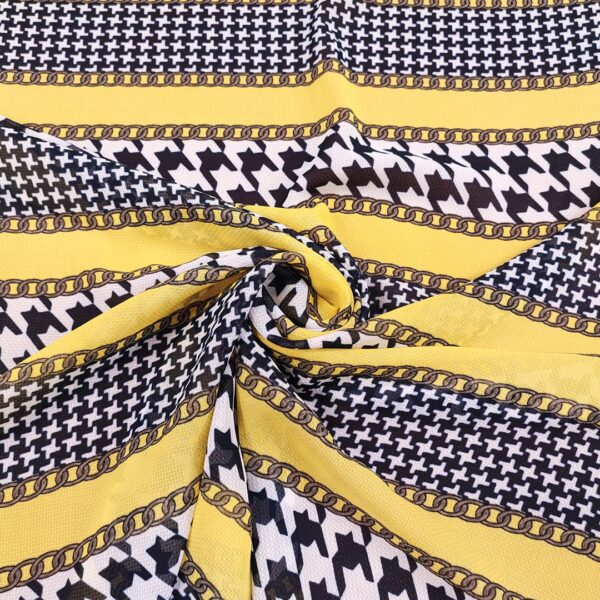 Tessuto Georgette a fantasia motivo astratto nero - giallo - bianco