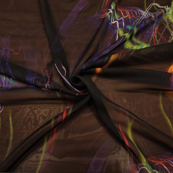 Tessuto Georgette a fantasia motivo  astratto nero - indaco - arancione - verde