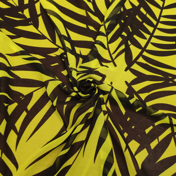 Tessuto Georgette a fantasia motivo astratto verde acido - nero