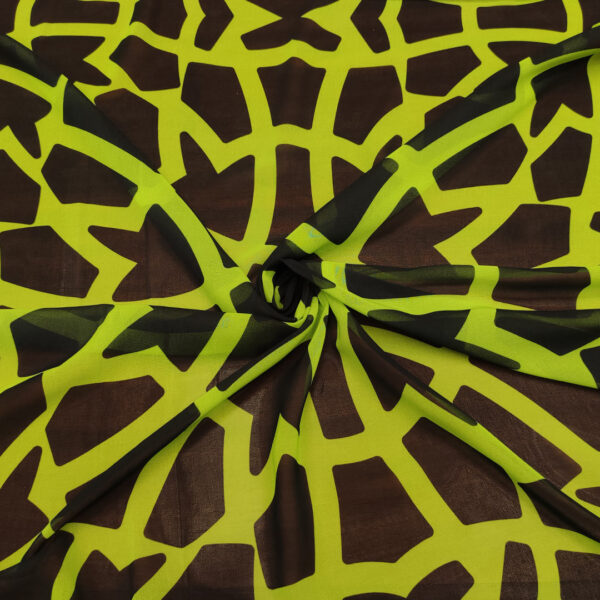 Tessuto Georgette a fantasia motivo astratto nero - verde acido