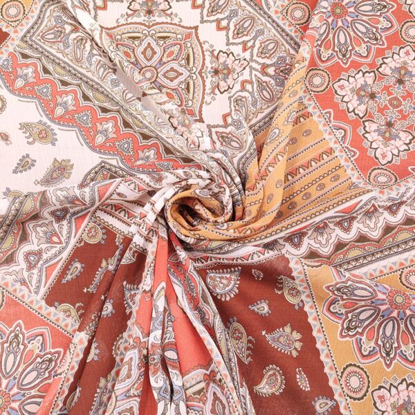 Tessuto Georgette a fantasia motivo etnico arancione - tabacco - ocra