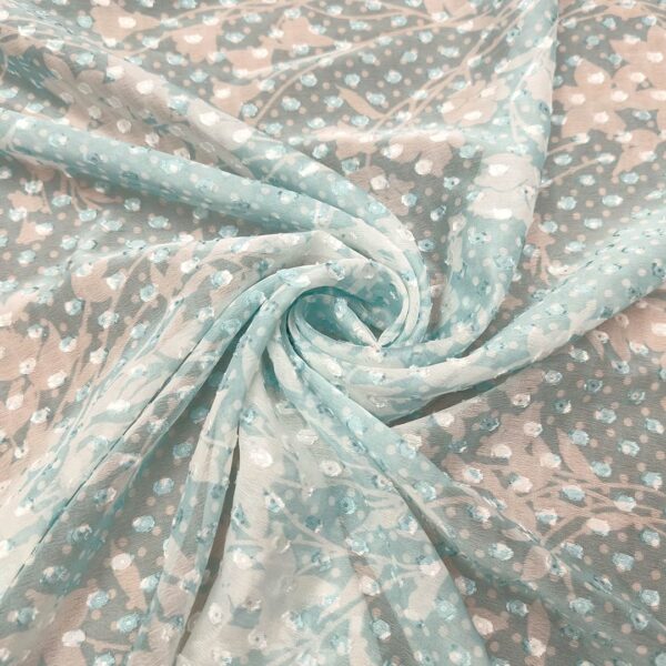 Tessuto Georgette a fantasia motivo floreale acquamarina - bianco