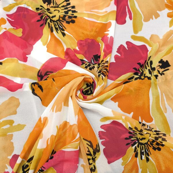 Tessuto Georgette a fantasia motivo floreale arancione - fucsia - bianco