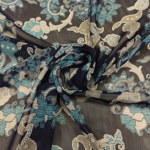 Tessuto Georgette a fantasia motivo floreale cashmere blu - bianco - turchese