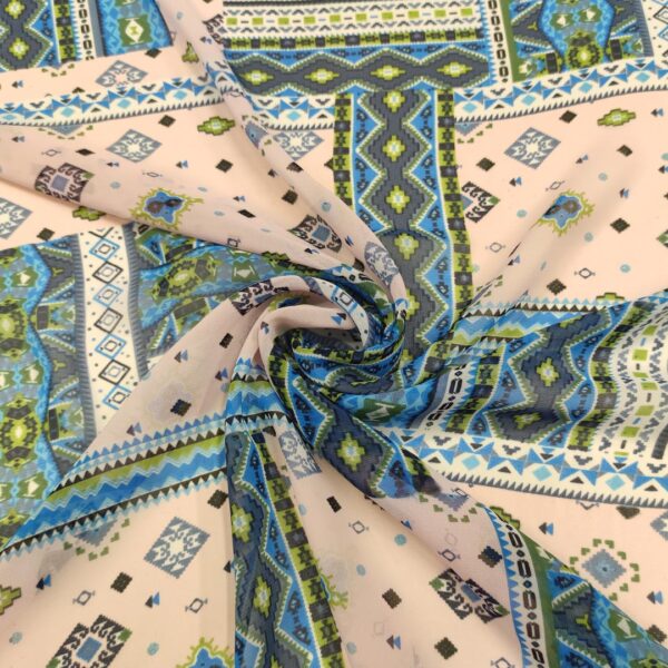 Tessuto Georgette a fantasia motivo geometrico azzurro - rosa - verde