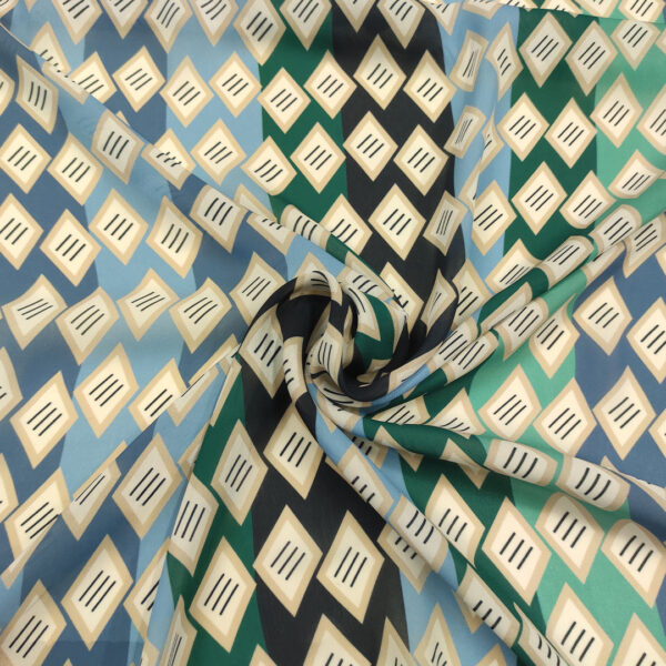 Tessuto Georgette a fantasia motivo geometrico blu - verde - celeste