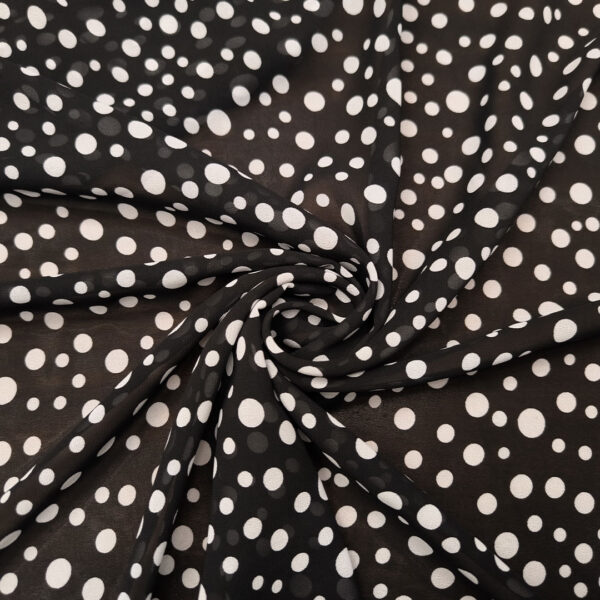 Tessuto Georgette a fantasia motivo pois nero - bianco