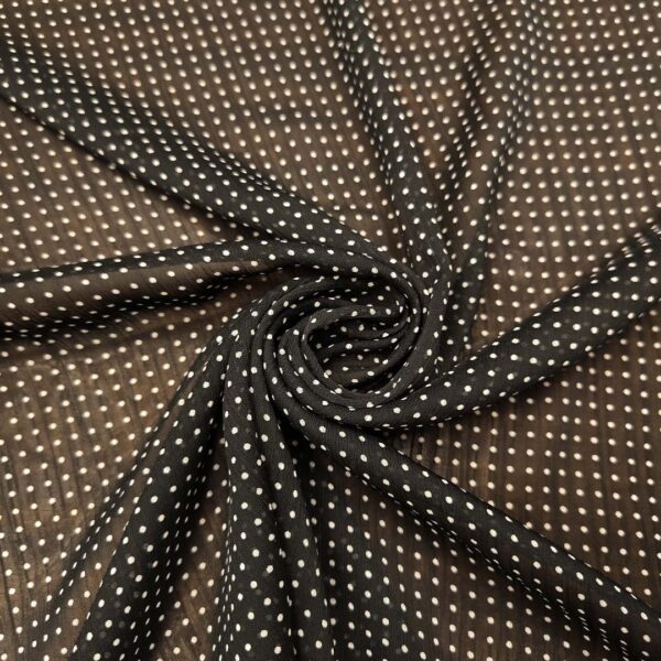 Tessuto Georgette a fantasia motivo pois piccolo nero - bianco