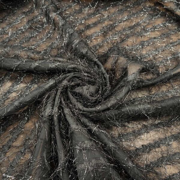 Tessuto Georgette con frange lurex nero