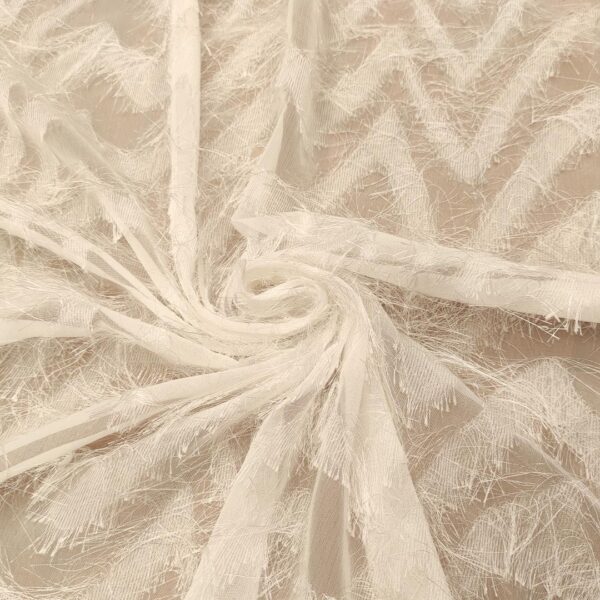 Tessuto Georgette con frange motivo geometrico bianco