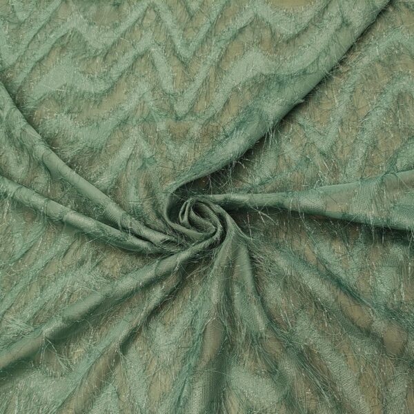 Tessuto Georgette con frange motivo geometrico verde salvia