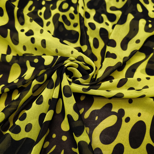 Tessuto Georgette a fantasia motivo astratto giallo - nero