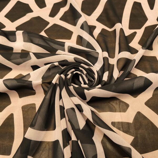 Tessuto Georgette a fantasia motivo astratto nero - rosa antico