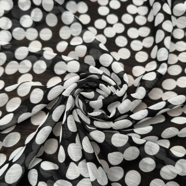 Tessuto Georgette a fantasia motivo pois bianco - nero