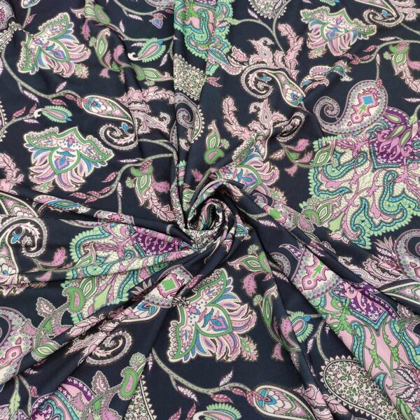 Tessuto jersey a fantasia motivo etnico blu - rosa - verde