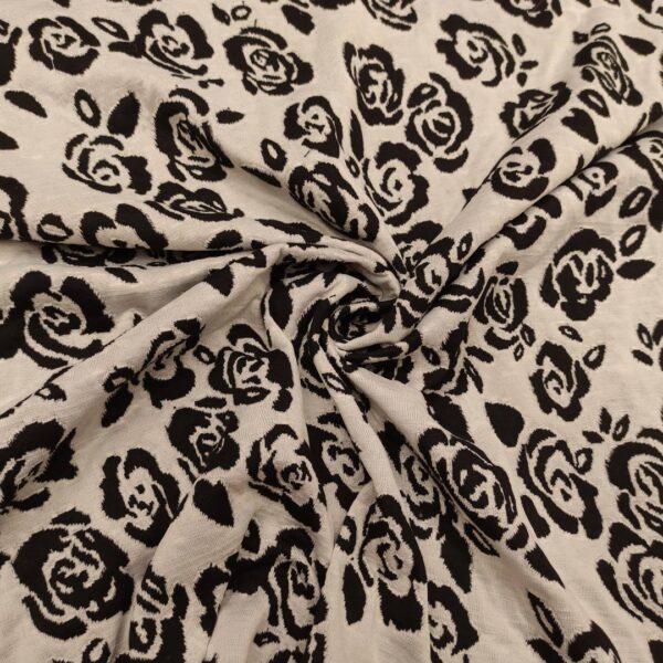 Tessuto jersey peso autunnale a fantasia motivo floreale grigio - nero