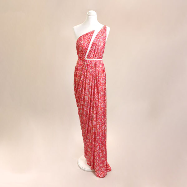 Tessuto jersey a fantasia motivo geometrico arancione - rosa