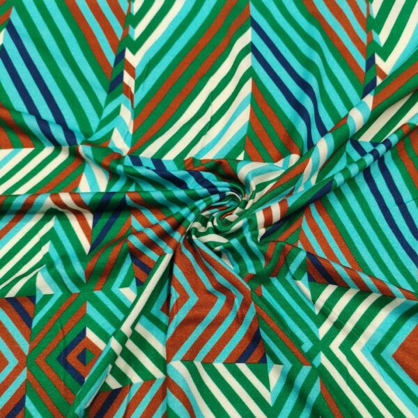 Tessuto jersey di viscosa a fantasia motivo geometrico verde smeraldo - tabacco
