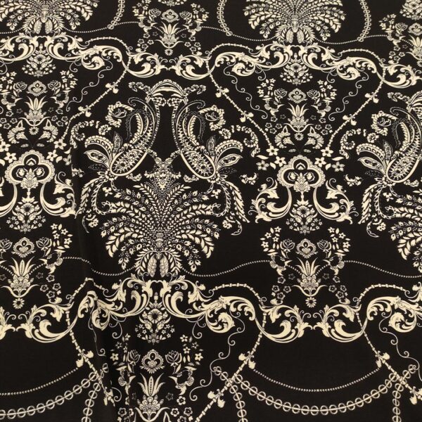 Tessuto Jersey di viscosa a fantasia motivo floreale cashmere panna - nero