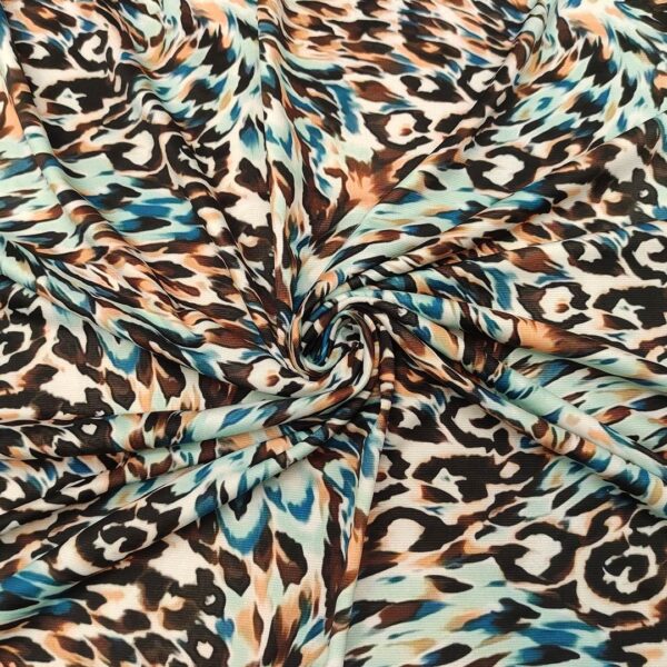 Tessuto Jersey a fantasia motivo animalier acquamarina - marrone - blu
