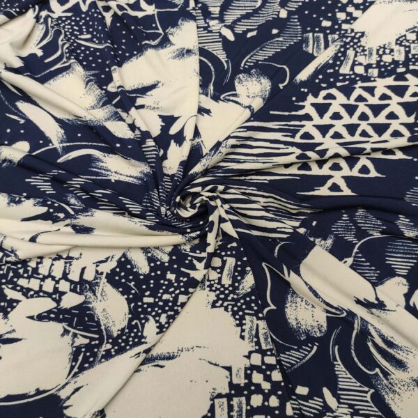 Tessuto Jersey a fantasia motivo astratto bianco - blu