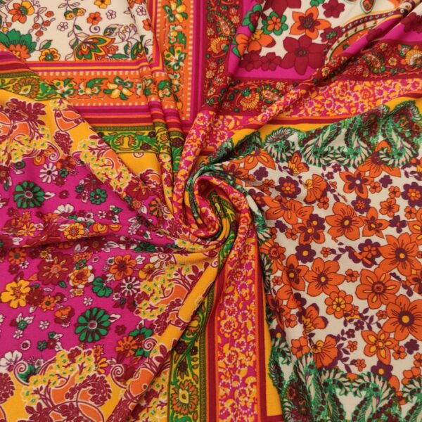 Tessuto Jersey a fantasia motivo etnico fucsia - arancione - verde - bordeaux - viola