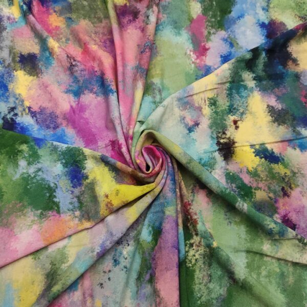 Tessuto Jersey a fantasia motivo astratto fucsia - blu - rosa - viola - verde