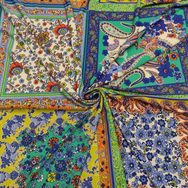 Tessuto Jersey a fantasia motivo etnico ocra - carta da zucchero - verde acido - verde petrolio - arancione - bianco