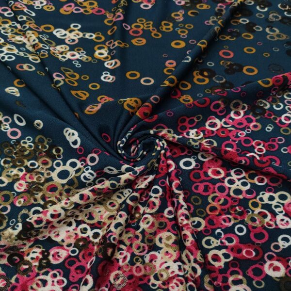 Tessuto Jersey a fantasia motivo astratto verde ottanio - fucsia - beige