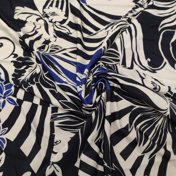 Tessuto Jersey a fantasia motivo floreale bianco - nero - blu elettrico