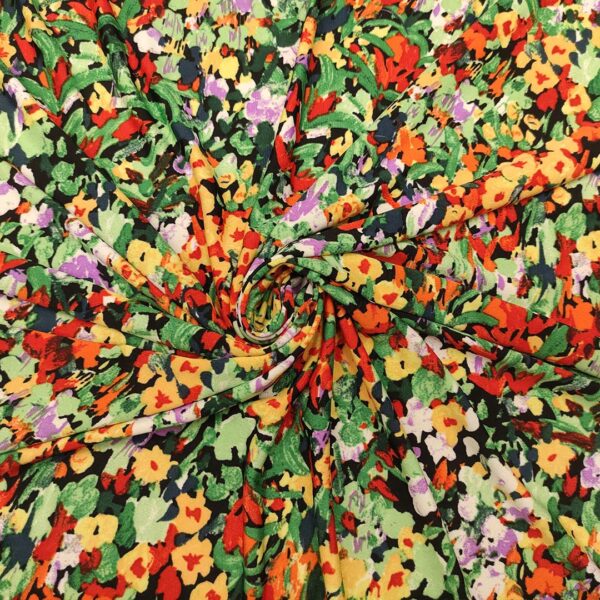 Tessuto Jersey a fantasia motivo floreale giallo - verde - lilla - rosso