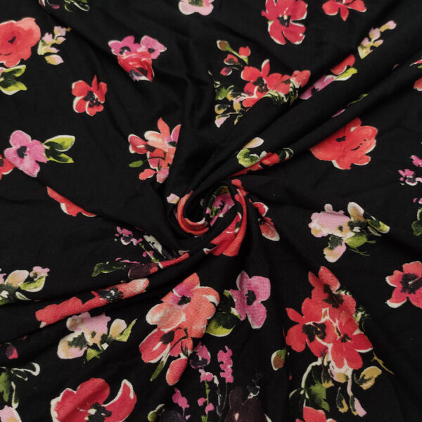 Tessuto Jersey a fantasia motivo floreale nero - rosso - rosa