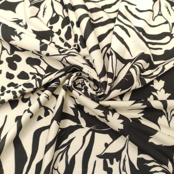 Tessuto Jersey a fantasia motivo floreale panna - nero