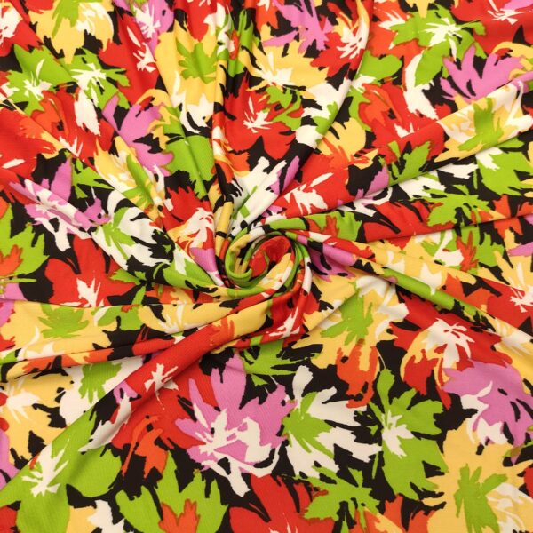 Tessuto Jersey a fantasia motivo floreale rosso - verde fluo - giallo - nero