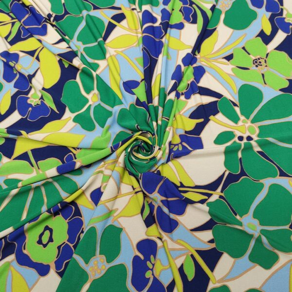Tessuto Jersey a fantasia motivo floreale verde acido - verde prato - blu - beige