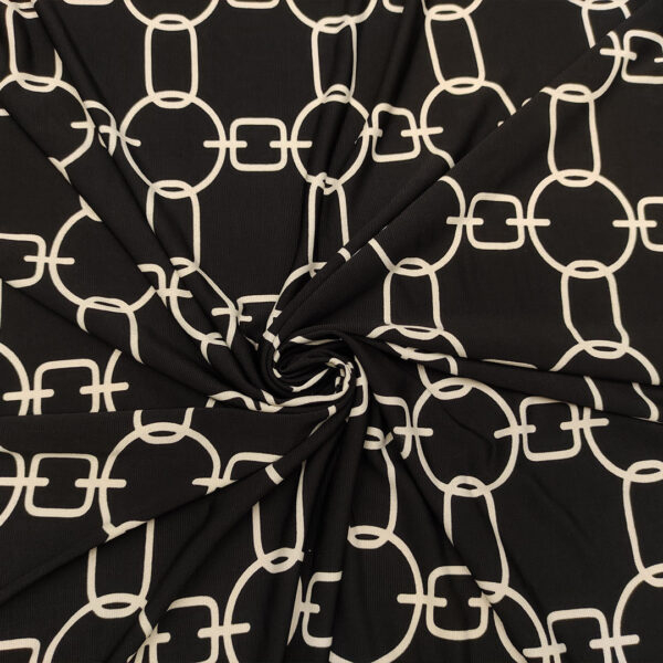 Tessuto Jersey a fantasia motivo geometrico nero - bianco