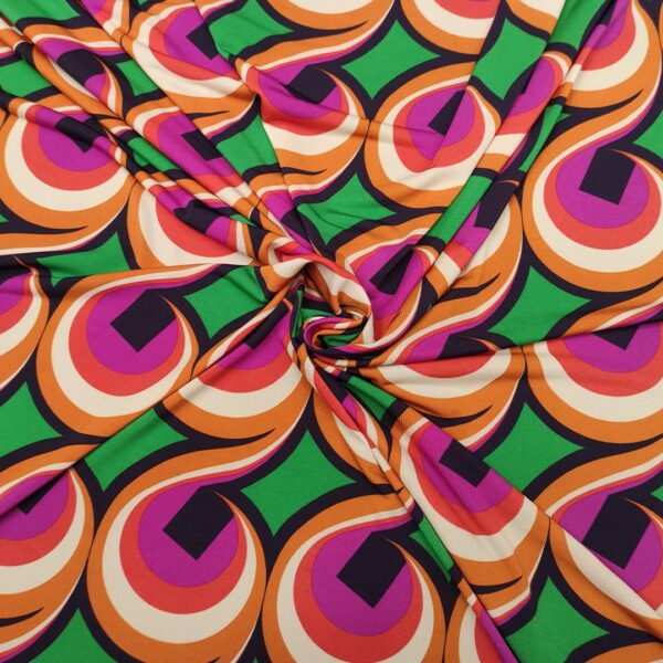 Tessuto Jersey a fantasia motivo geometrico verde prato - fucsia - ruggine