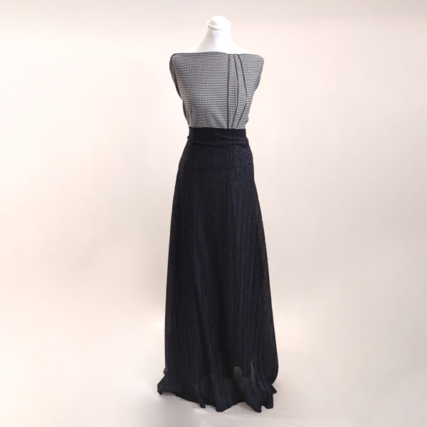 Tessuto Jersey Plissè lurex nero abbinato a tessuto pettinato motivo pied de poule