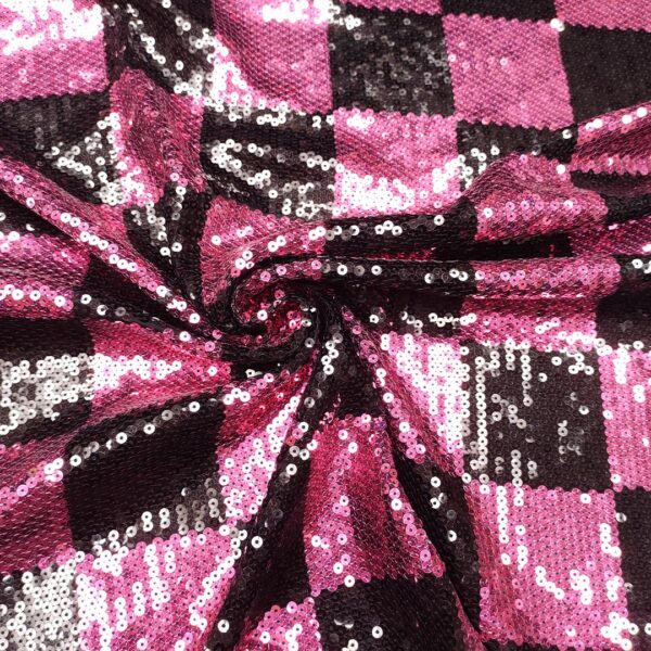 Tessuto Jersey ricamato con paillettes motivo geometrico fucsia - nero